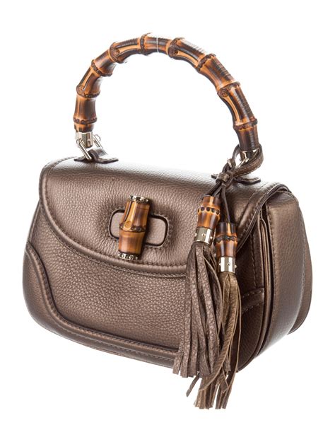 gucci bags with bamboo handles|gucci bamboo top handle bag.